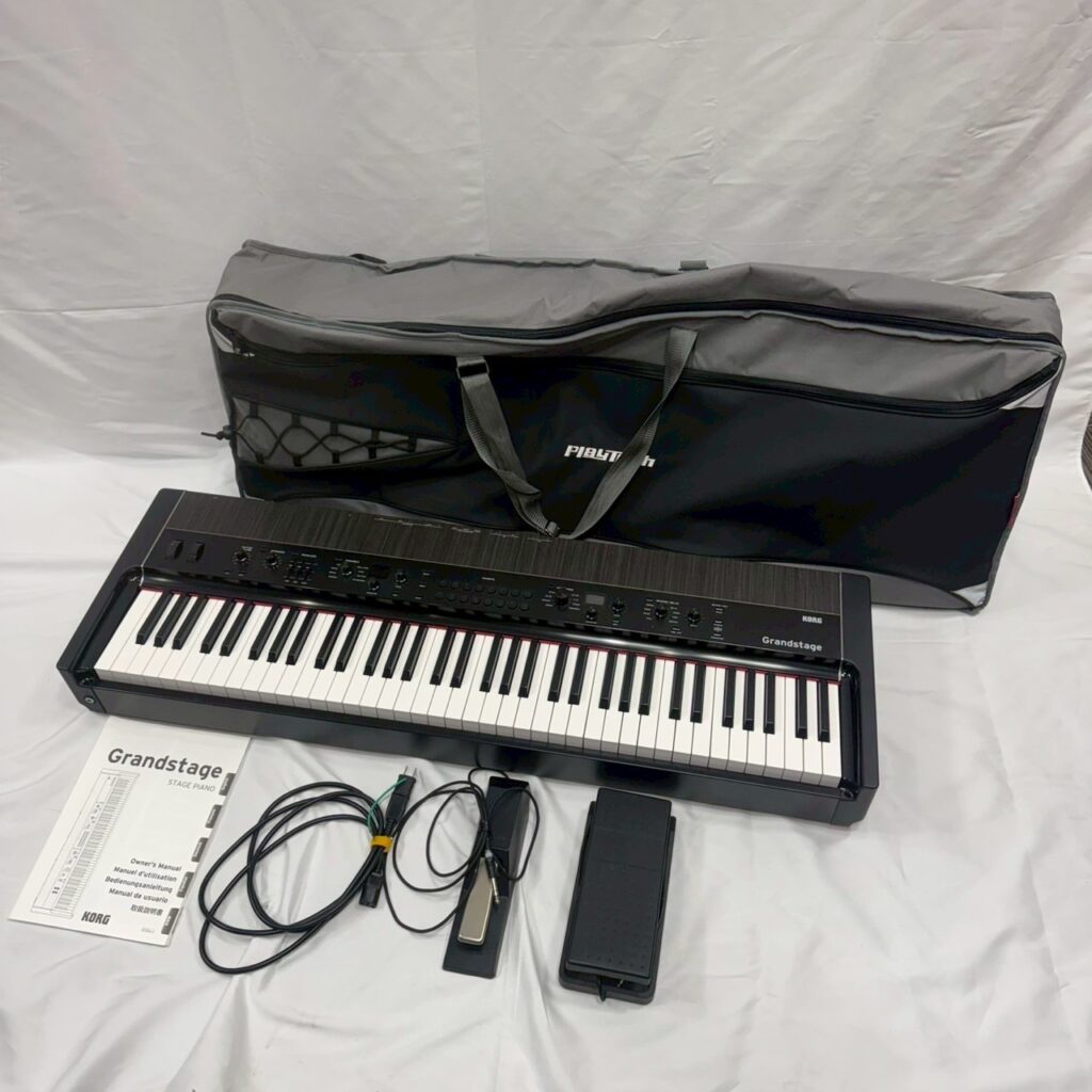 KORG GS1-73の電子ピアノ。木目調の美しい外装と73鍵の鍵盤が特徴的なヴィンテージモデル。淡路市で出張買取された実機写真。